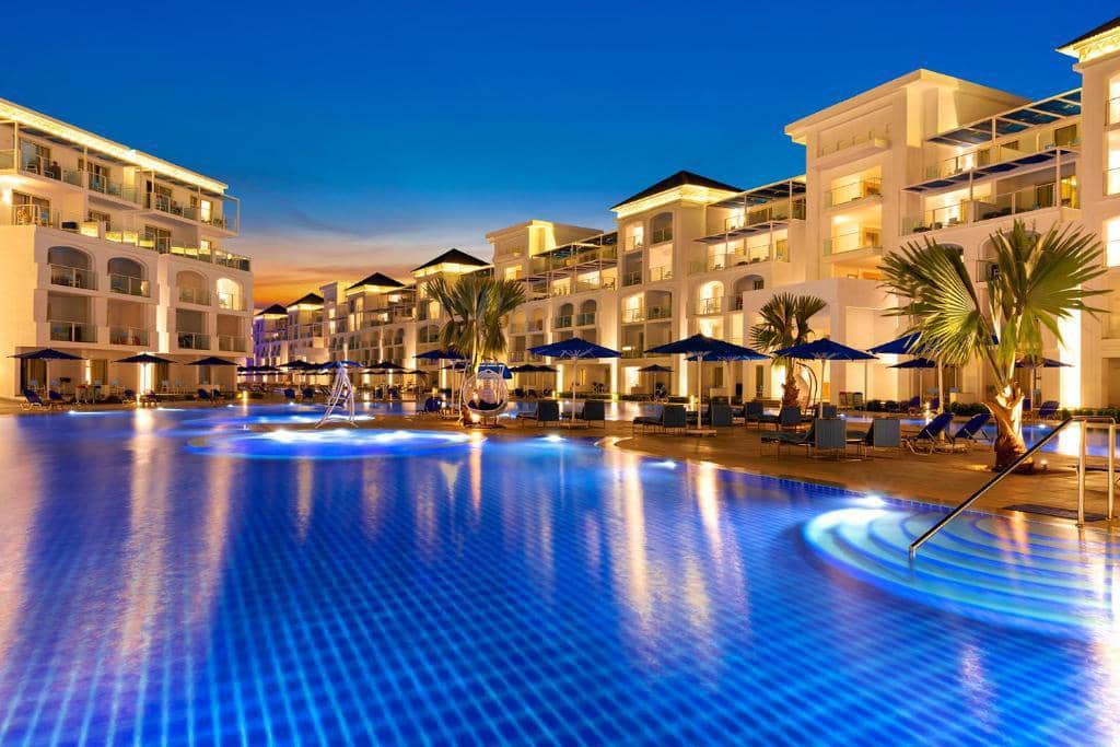 Blu Spa Resort swimming pools and guest buildings.